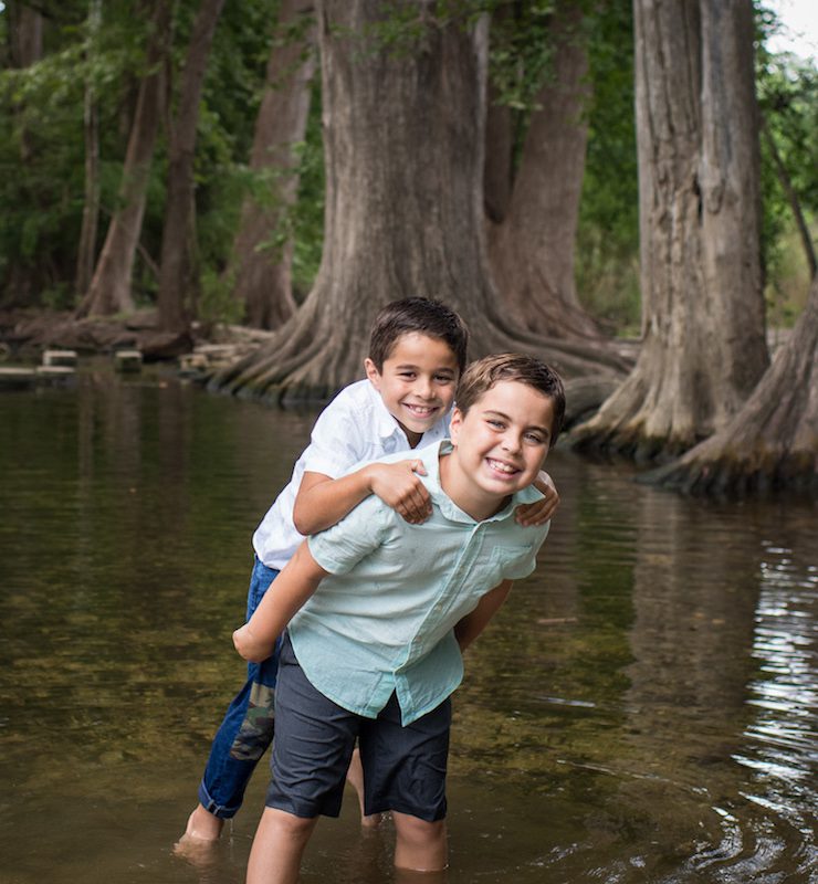 Family Photographer, boys playing in a creek