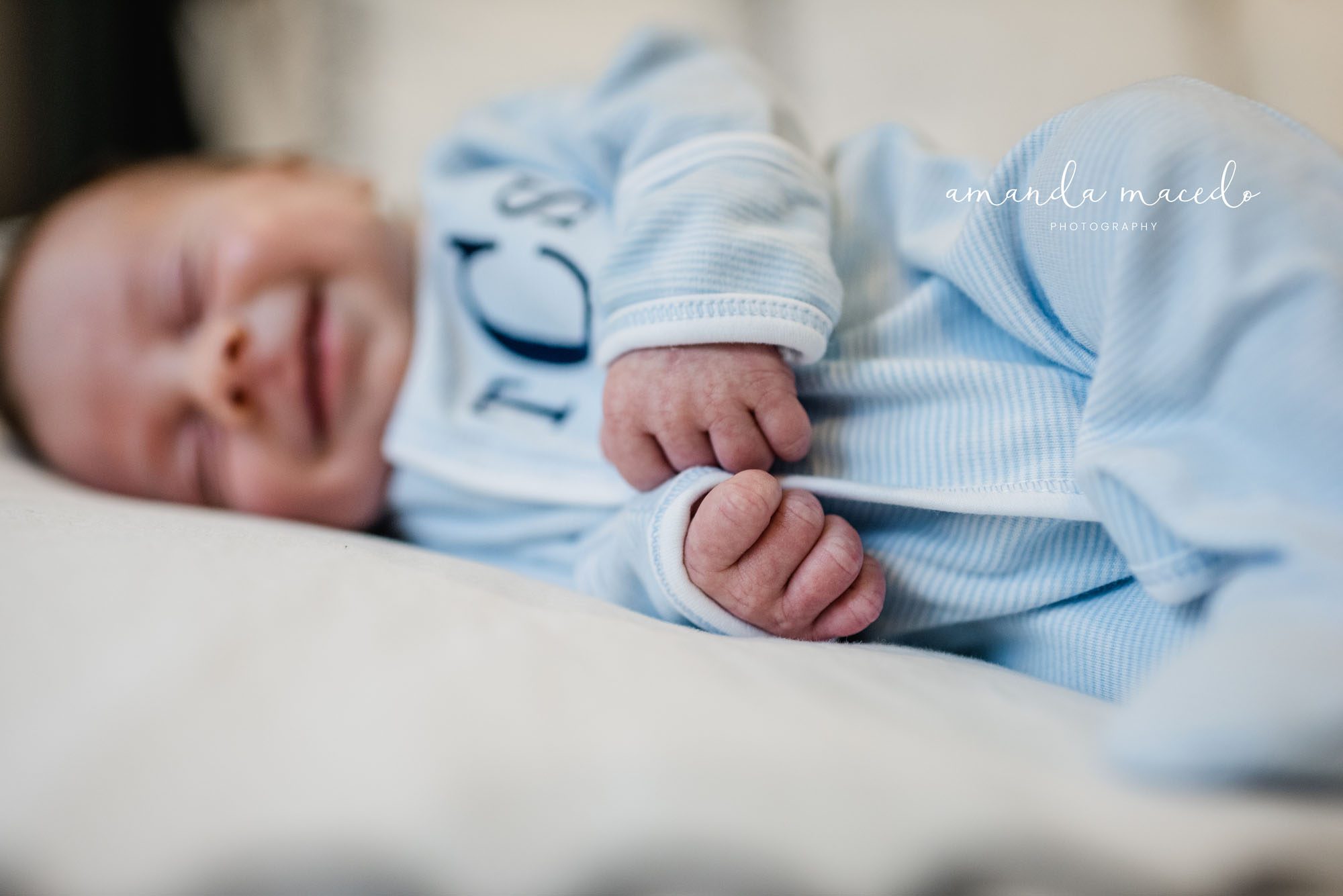 Newborn photographer, close up of baby hands