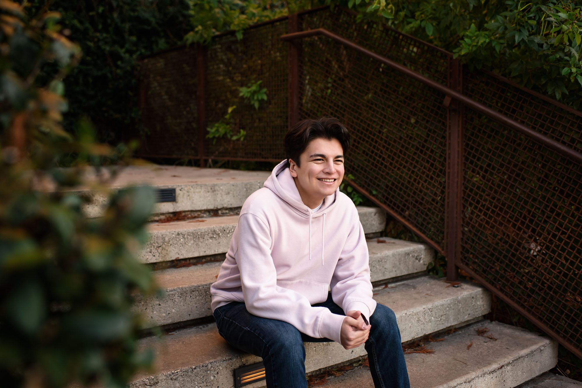 Boy sitting on steps, San Antonio Senior photographer
