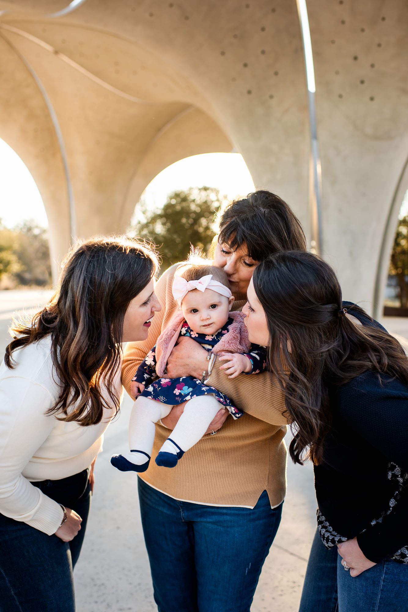 Girls gathered around baby, San Antonio lifestyle family photographer