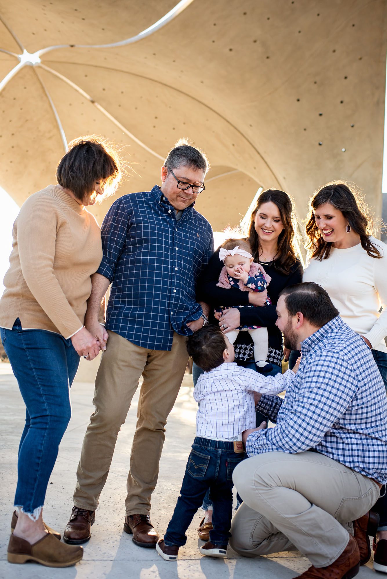 Family gathered around baby, San Antonio lifestyle family photographer