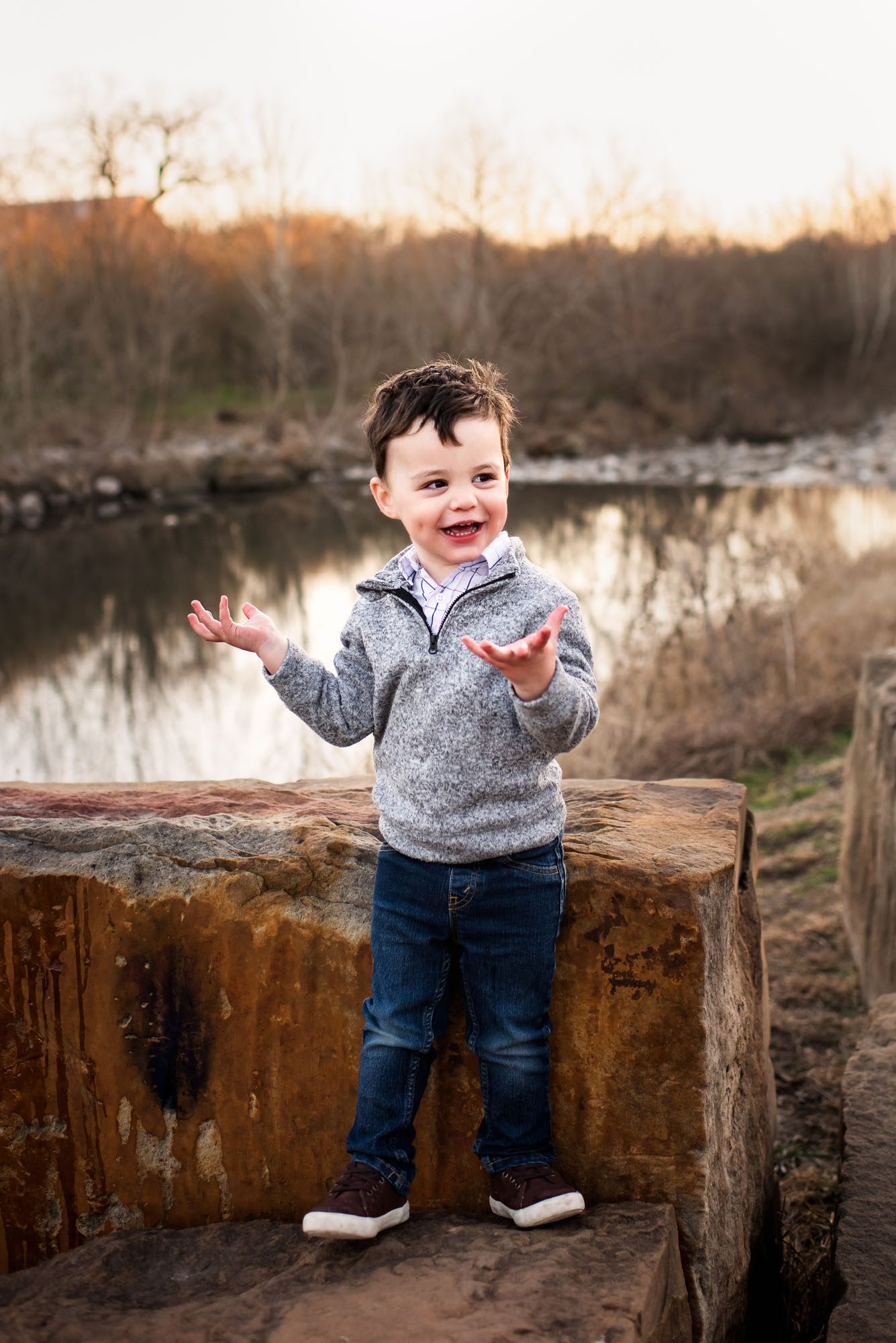 Boy standing by the river, San Antonio Family Photography