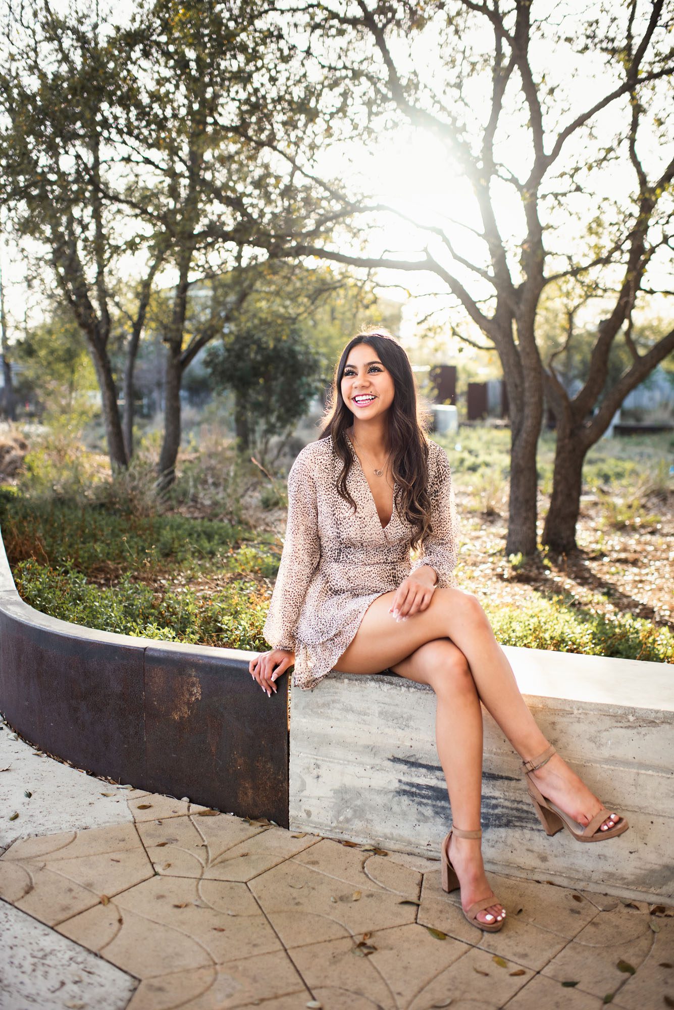 Senior girl sitting on ledge , Best San Antonio Senior Photography