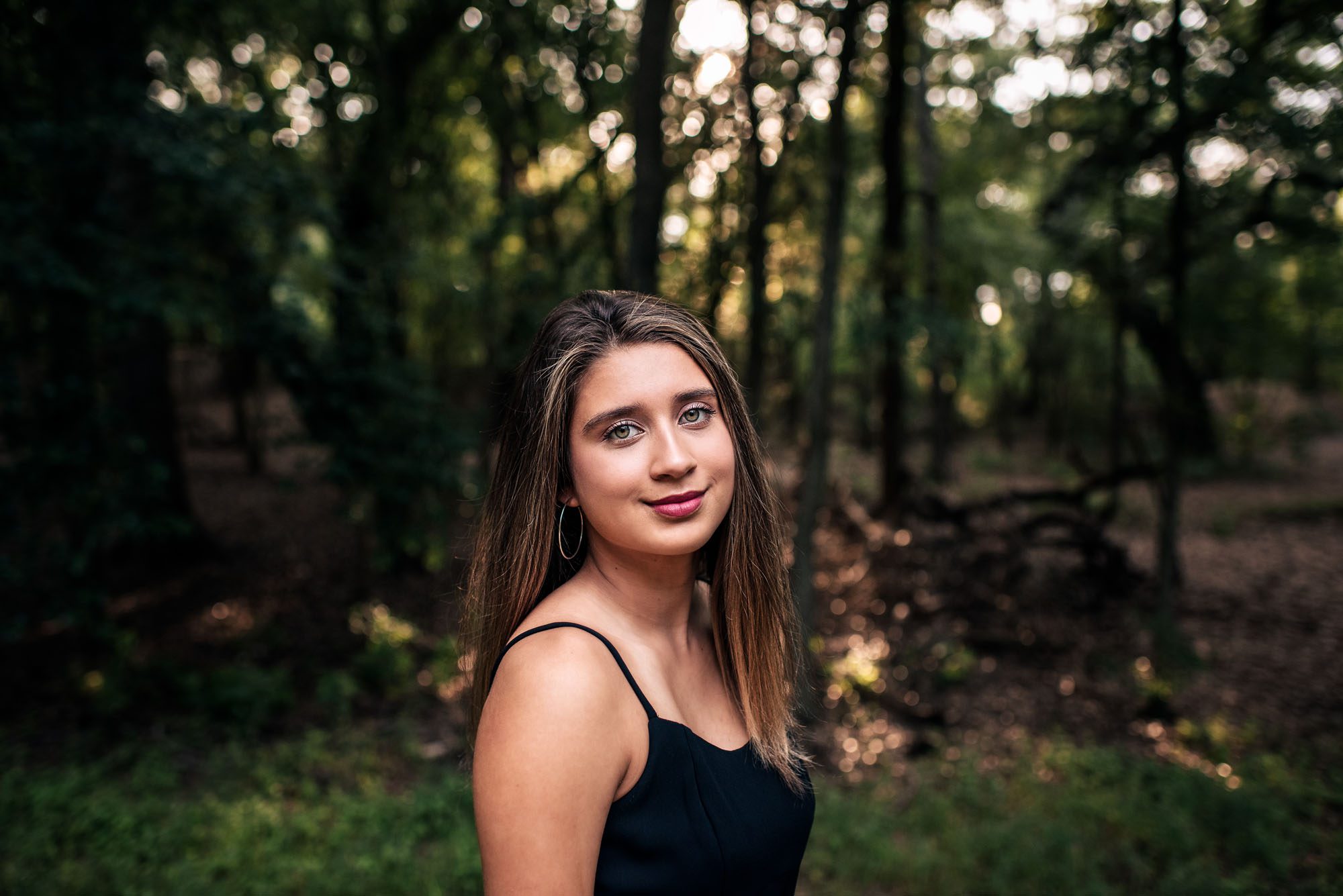 Portrait of senior girl in the woods, San Antonio Senior Photographer