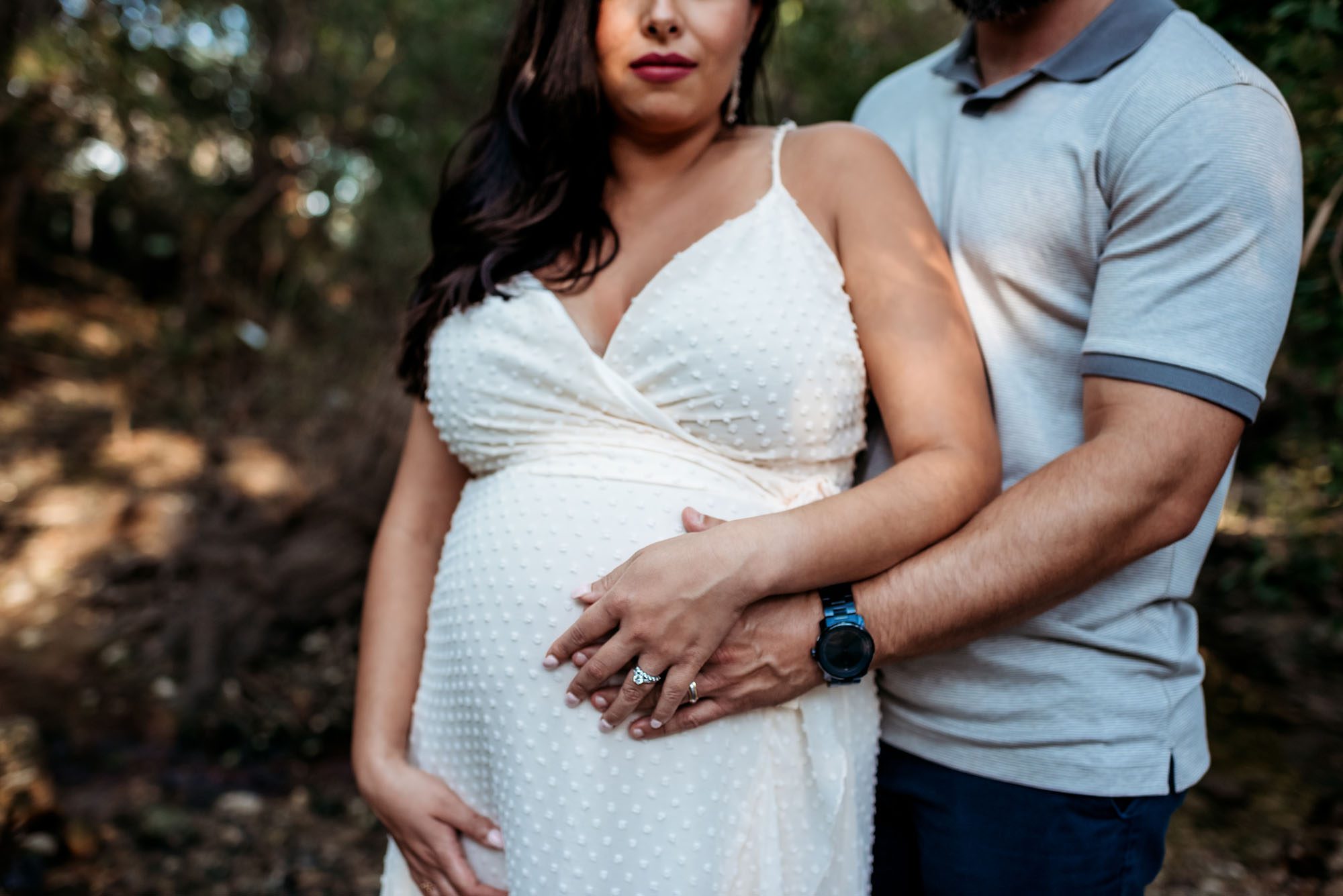 Expectant mother with hand on her belly, San Antonio Maternity Photographer