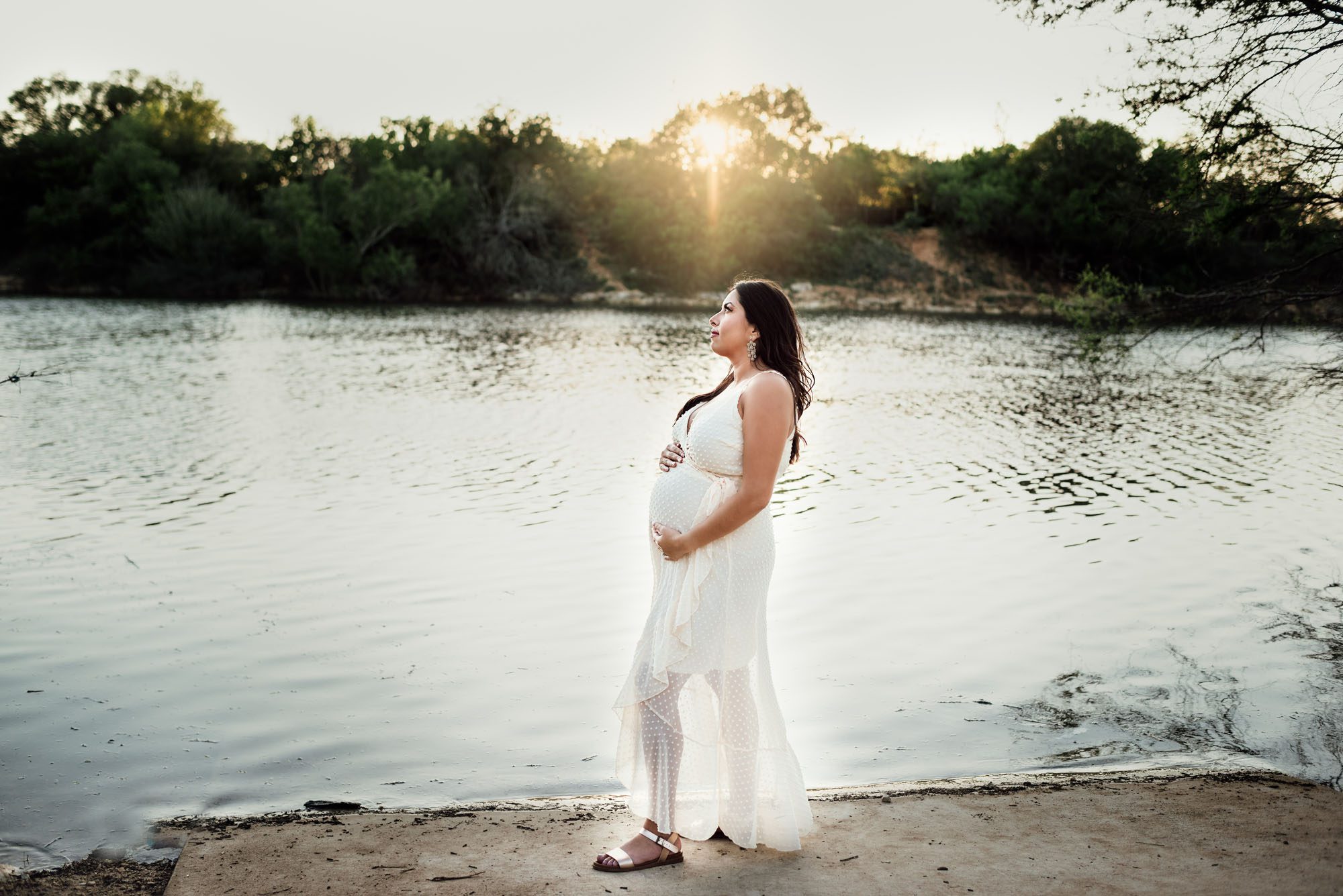 Expectant mother by the lake at sunset, San Antonio Maternity Photographer