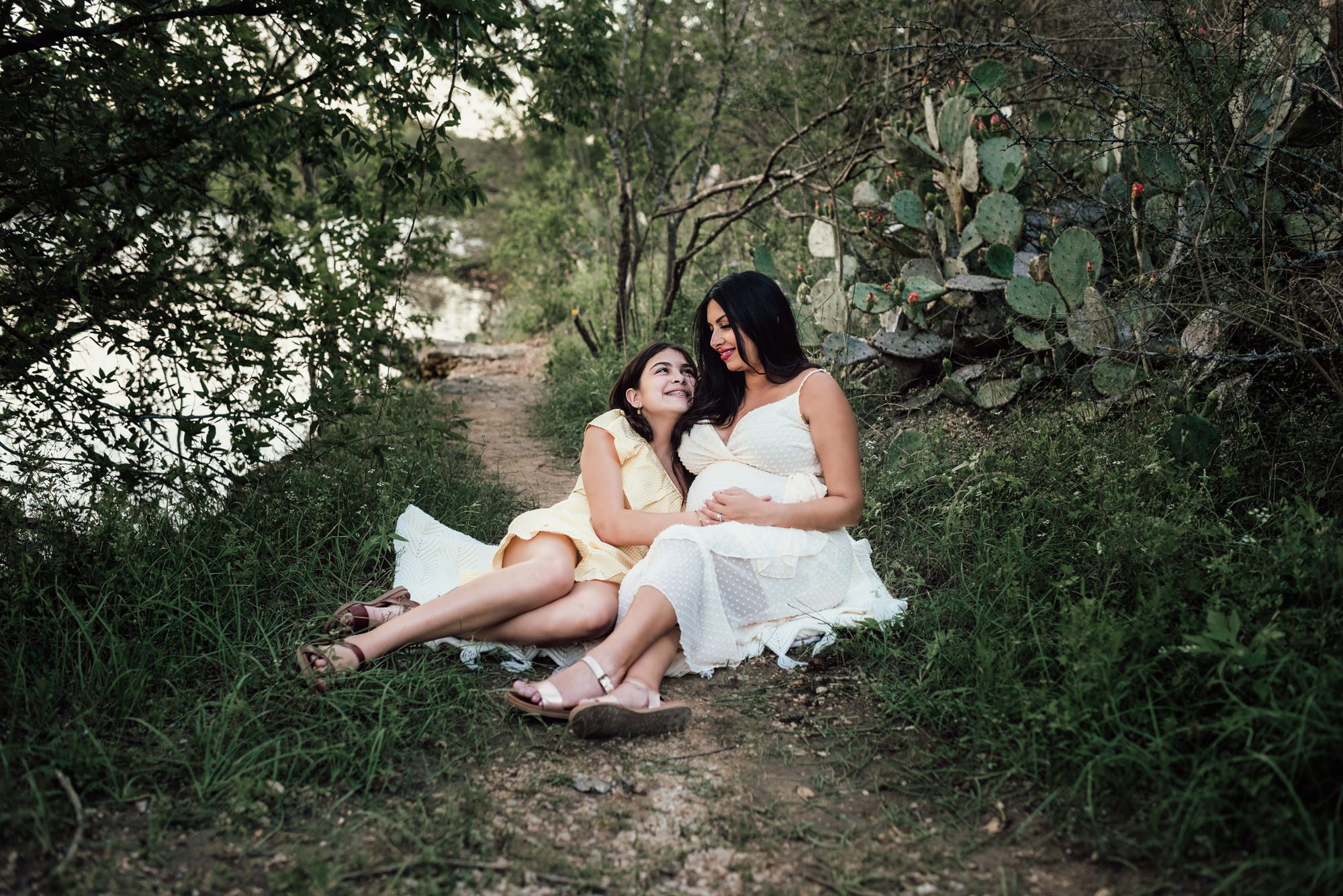 Mother and daughter sitting on blanket, San Antonio Maternity Lifestyle Photographer