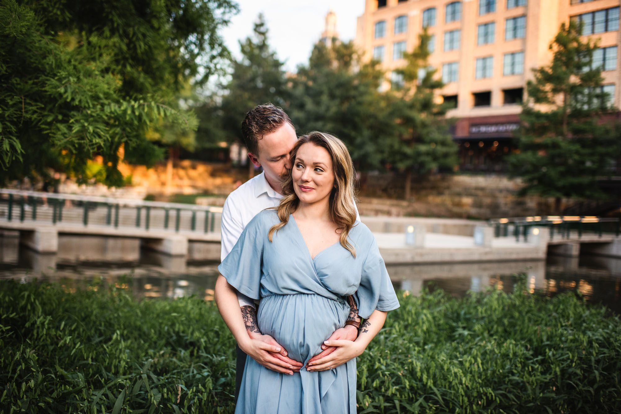 Husband snuggling pregnant wife, San Antonio maternity photographer