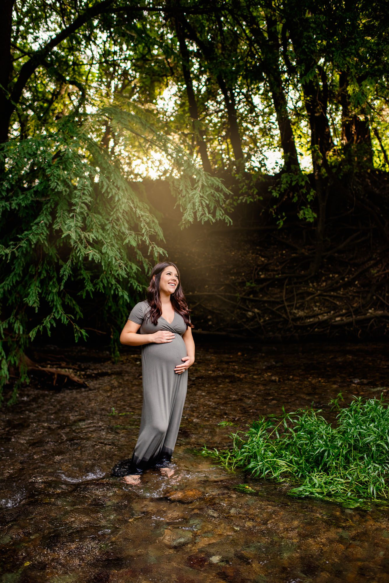 Pregnant woman standing in creek at sunset, San Antonio Maternity Photographer