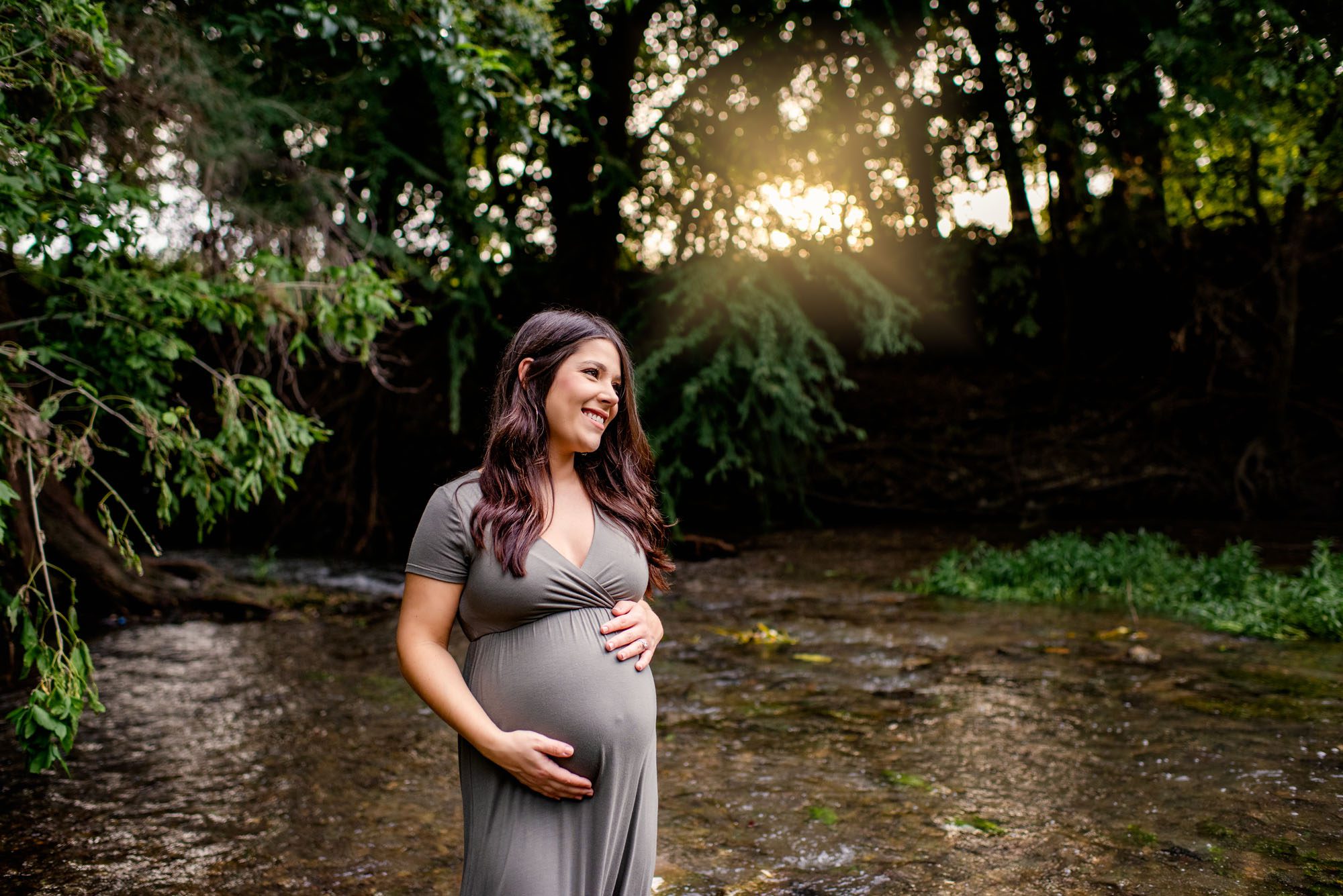Expectant mother standing in creek at sunset, San Antonio Maternity Photographer