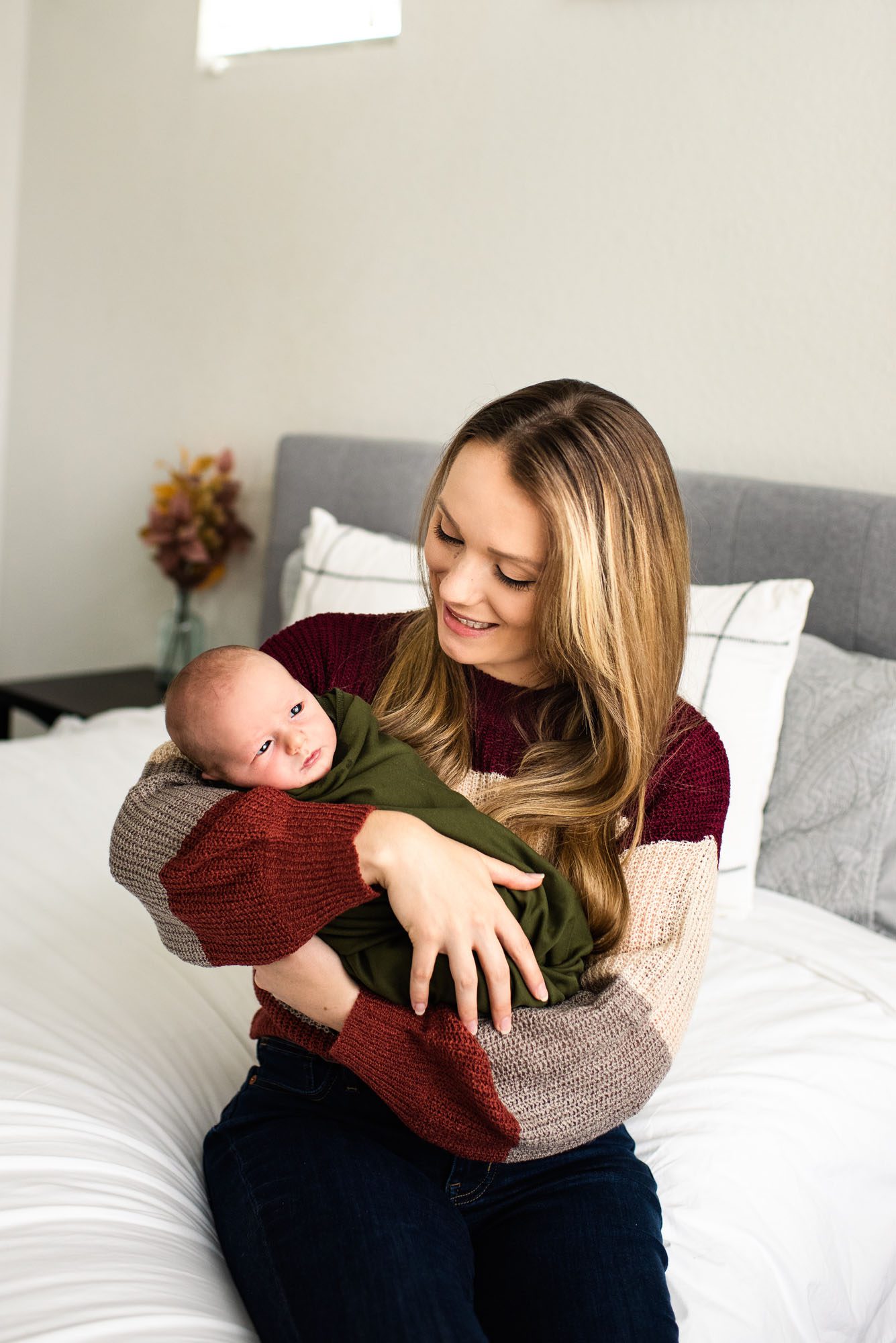 San Antonio Newborn Photography, Mom holding newborn son and smiling
