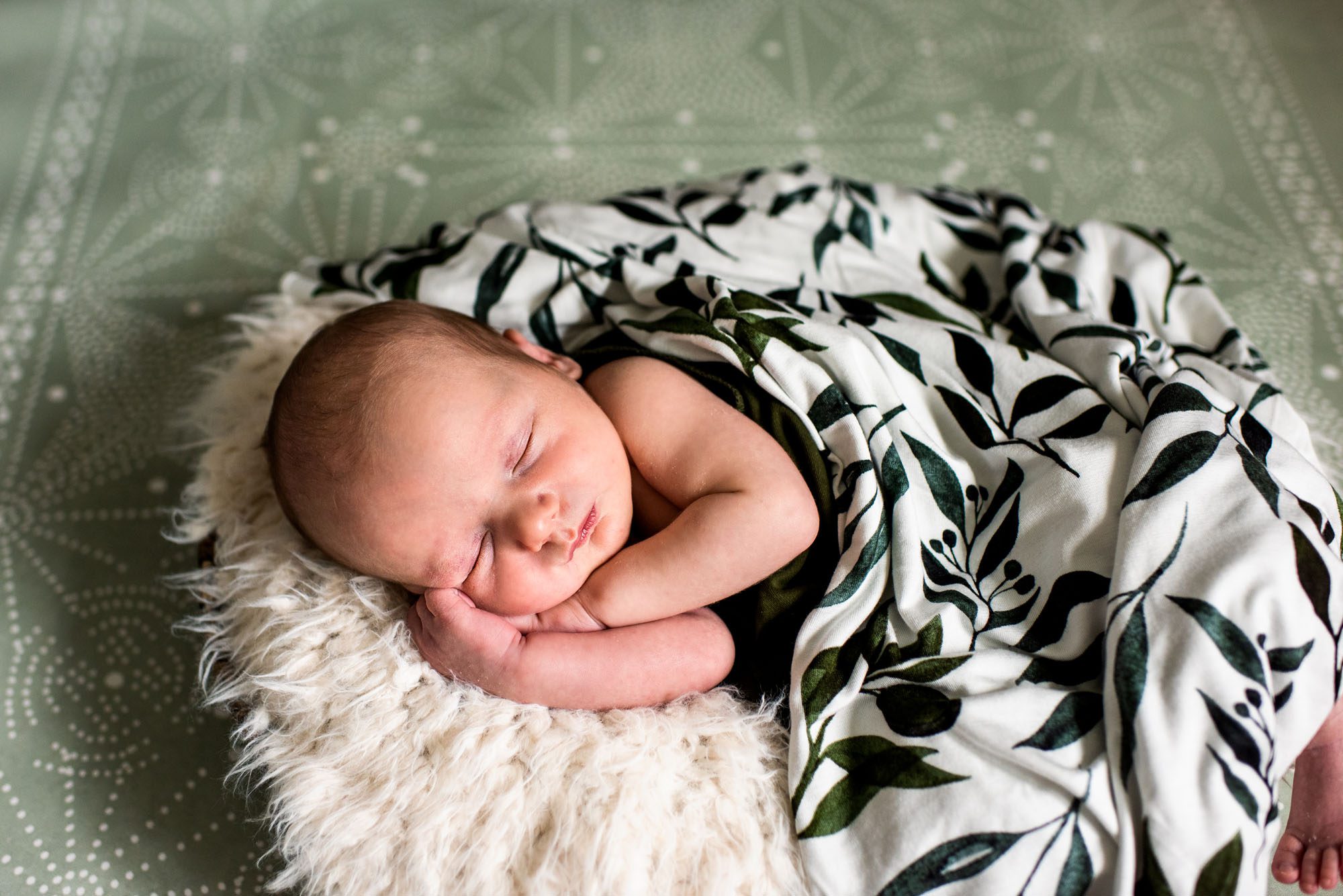 San Antonio Newborn Photographer, Close up shot of baby asleep in basket
