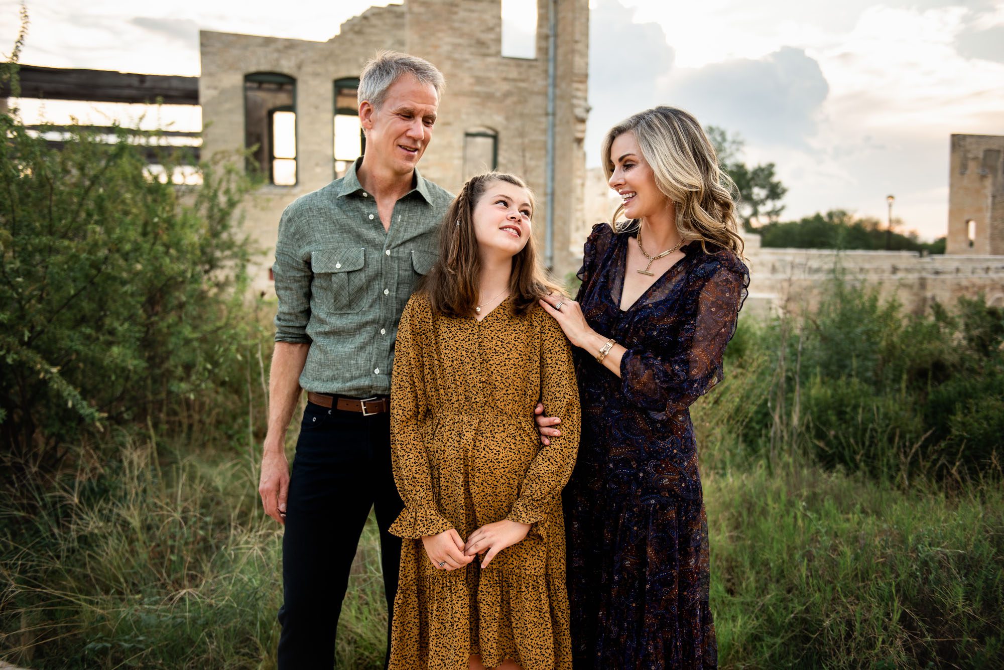 Family smiling at one another, Best San Antonio Lifestyle Family Photographer