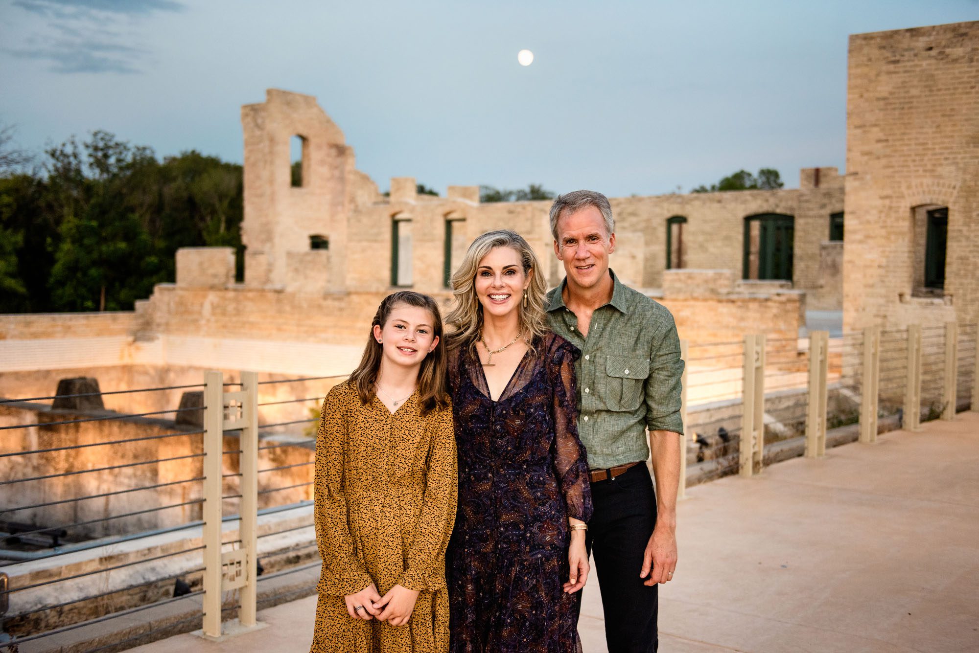 Family in front of old building with moon in the sky, San Antonio Lifestyle Photographer