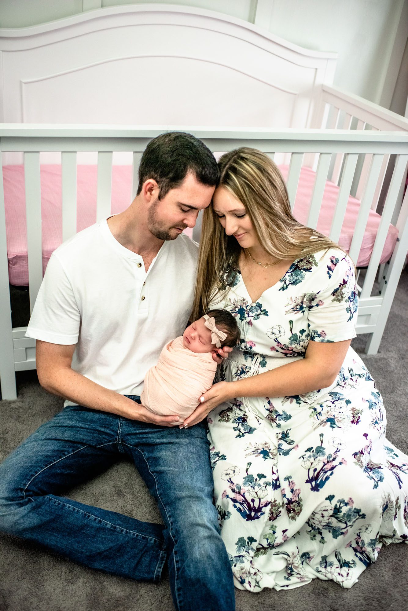 Couple holding newborn baby, Best Newborn Photographer