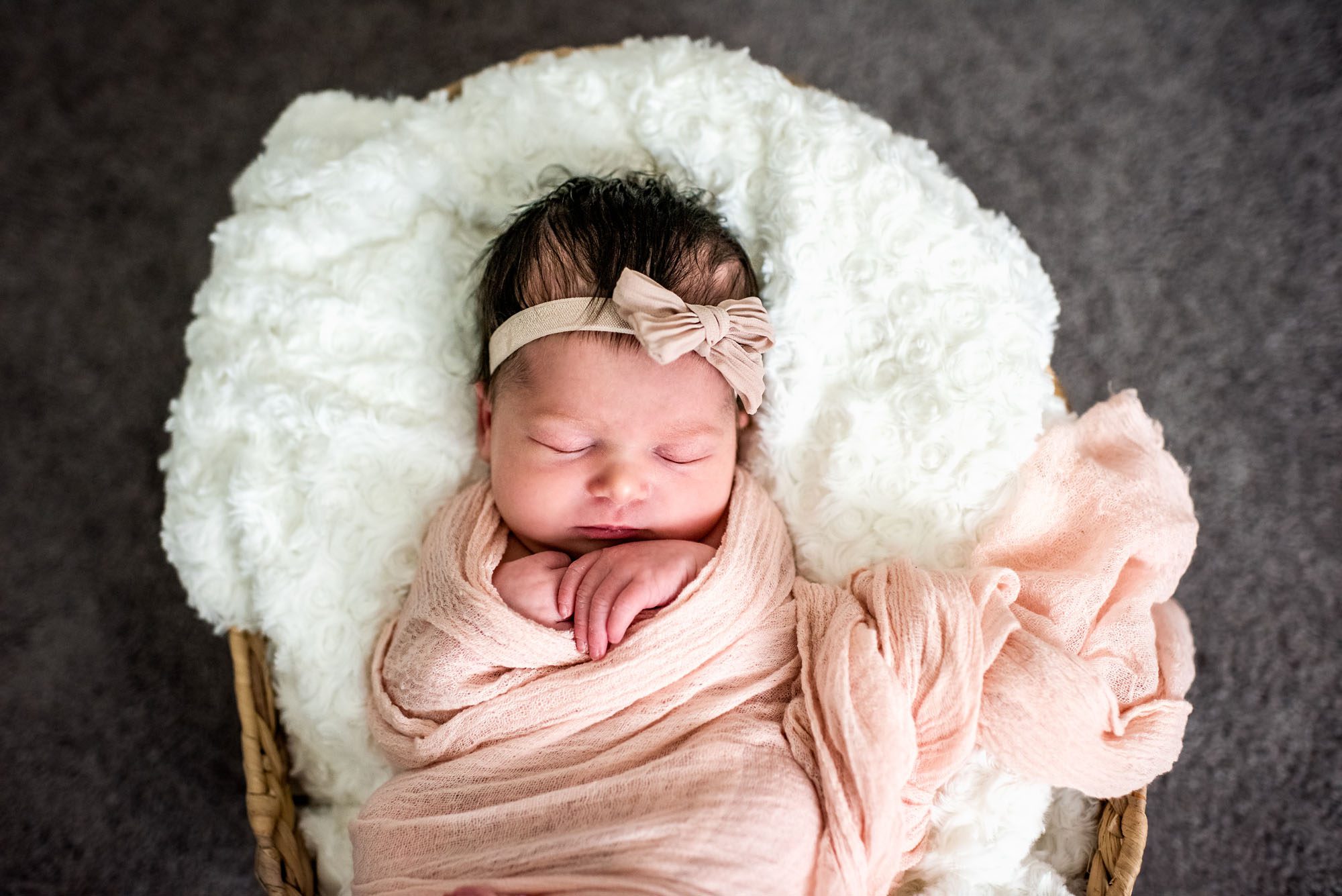 Newborn sleeping in pink wrap, San Antonio area Newborn Photographer