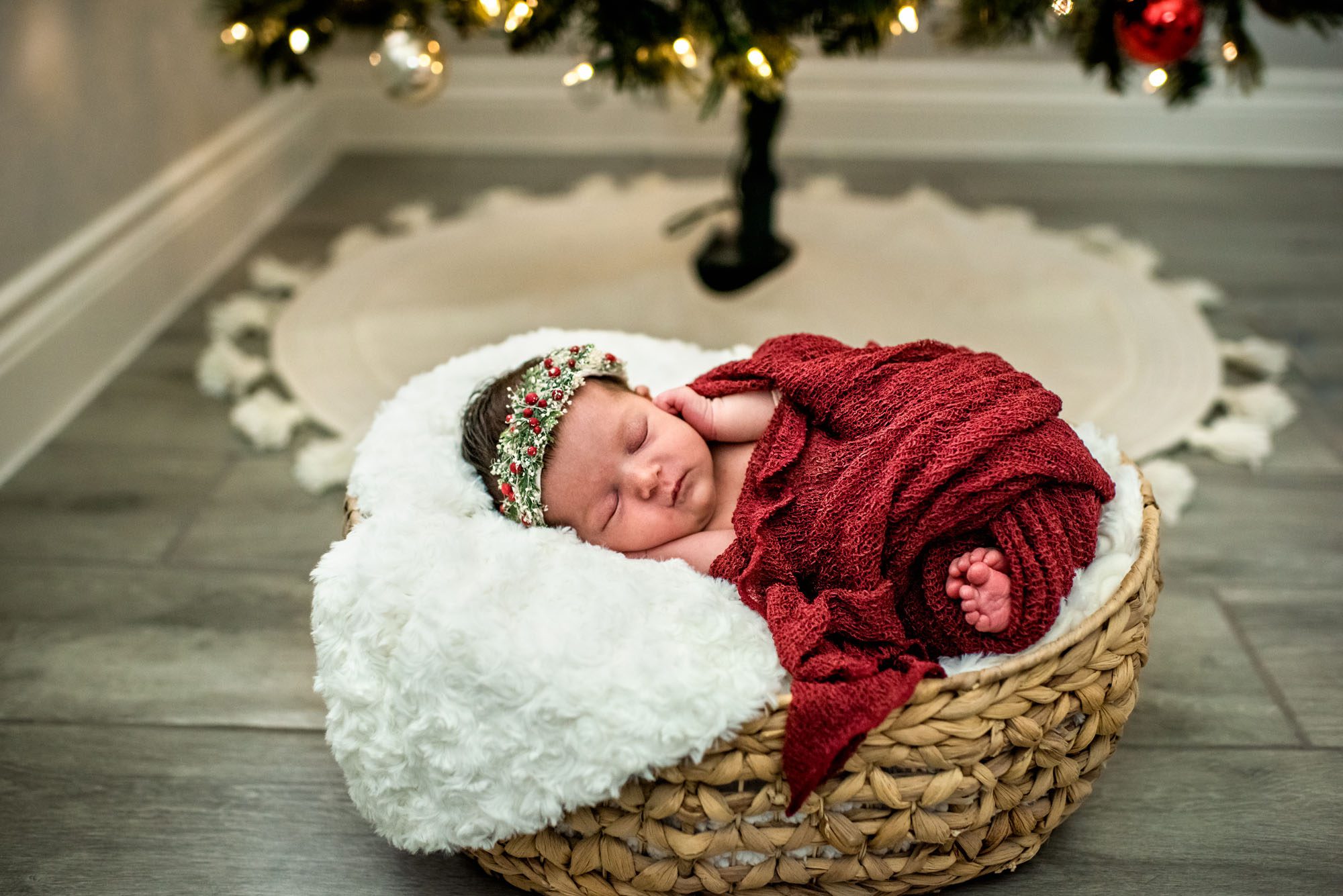 San Antonio Newborn Photographer, Baby sleeping under Christmas tree