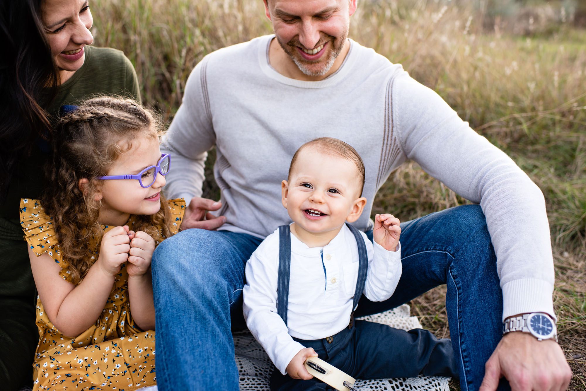 Family smiling at baby boy, San Antonio Family Photographer