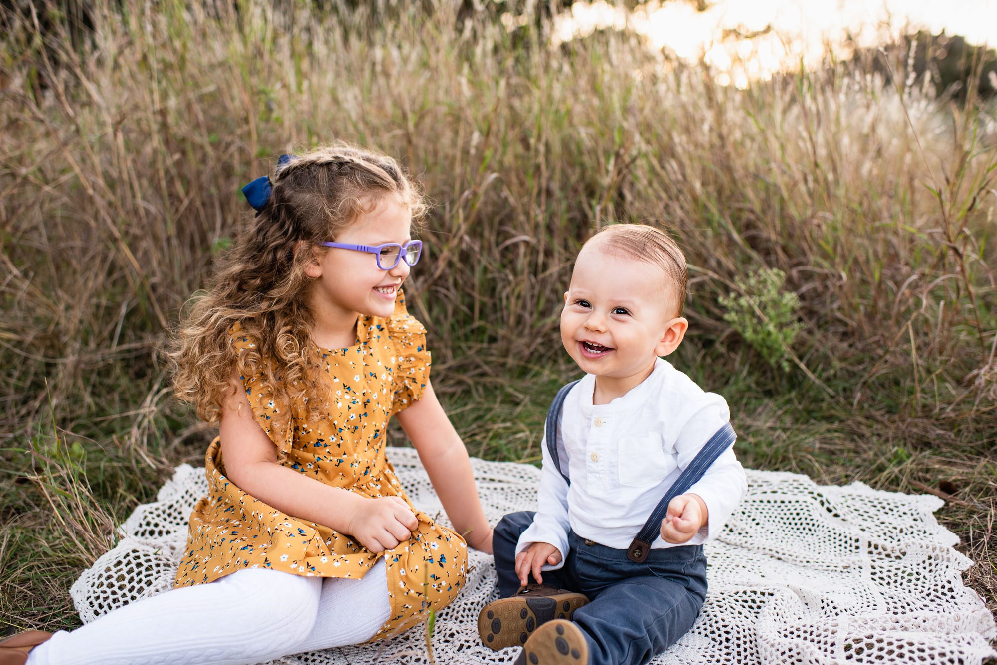 Brother and sister smiling at each other, San Antonio Family Photographer