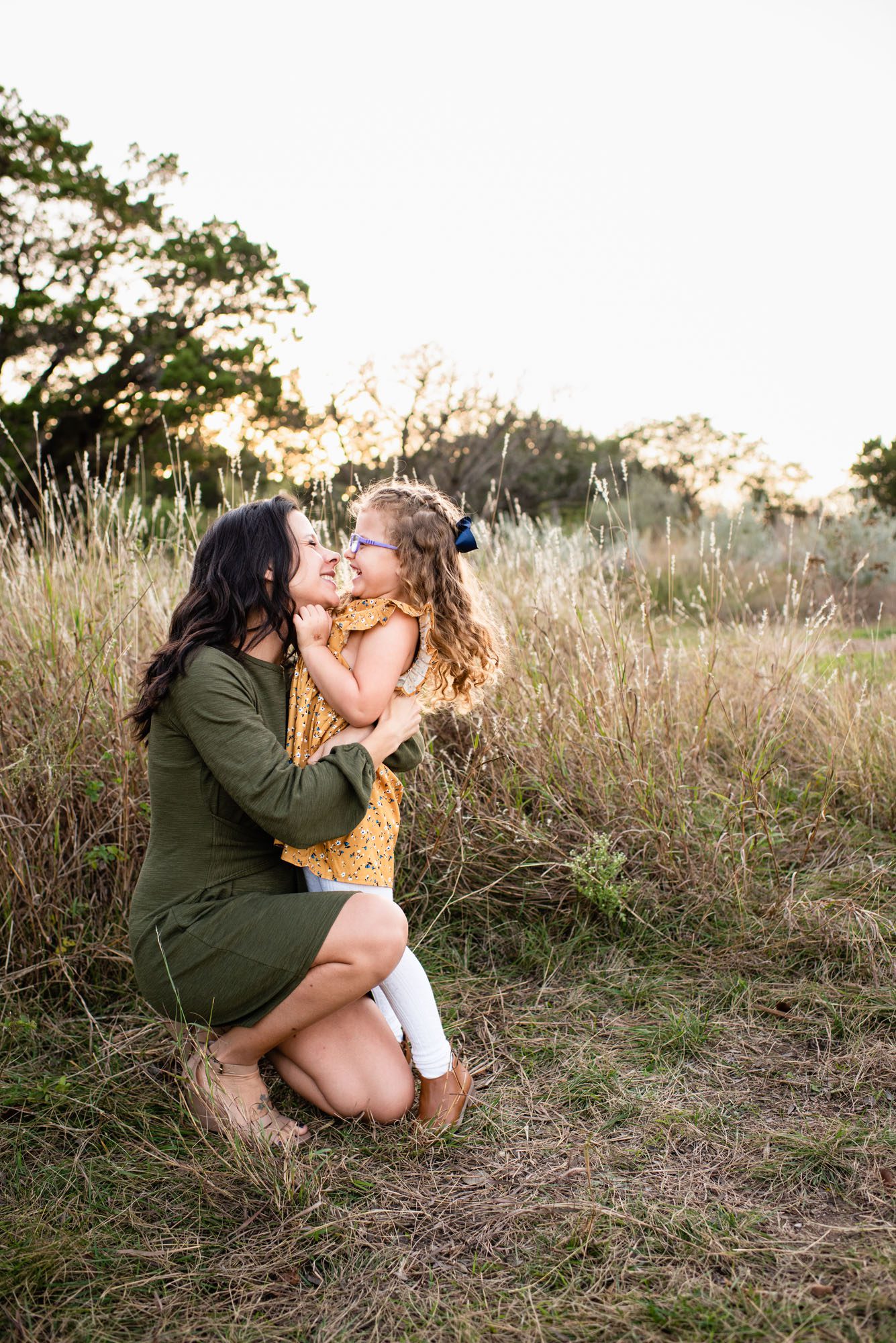 Mother and daughter hugging in the park, San Antonio Lifestyle Photographer