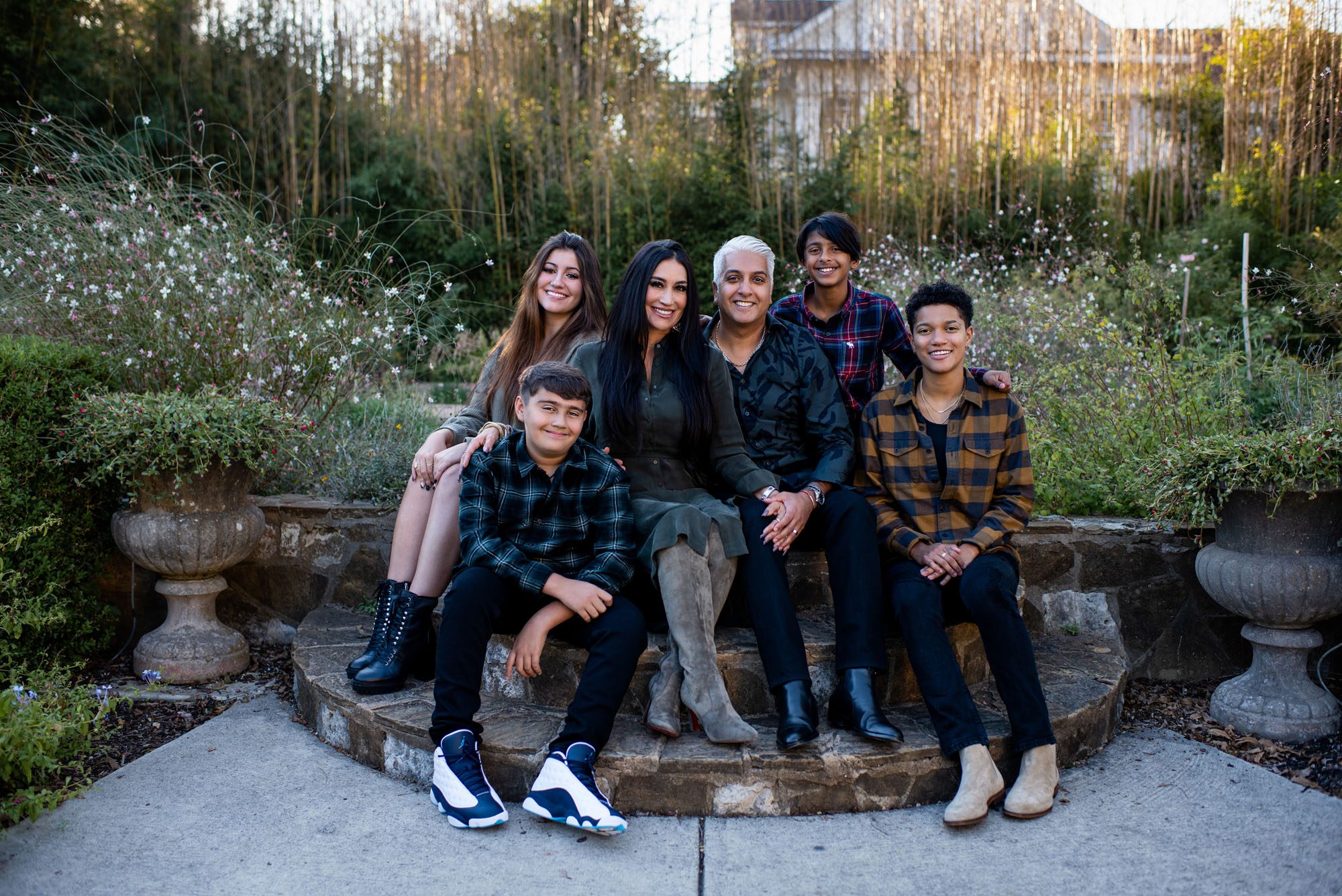 Family sitting together on steps, San Antonio Family Photographer