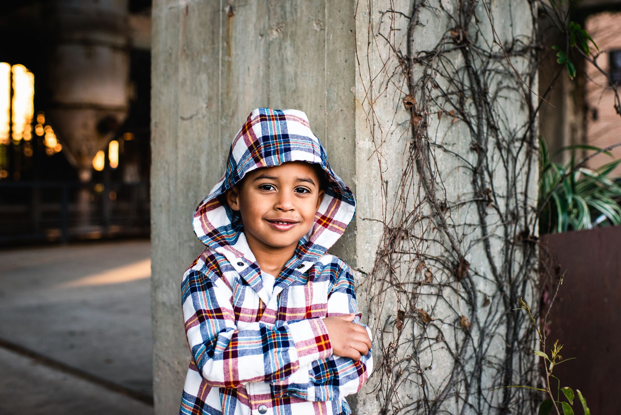 Boy posing by a column, Child Photographer San Antonio