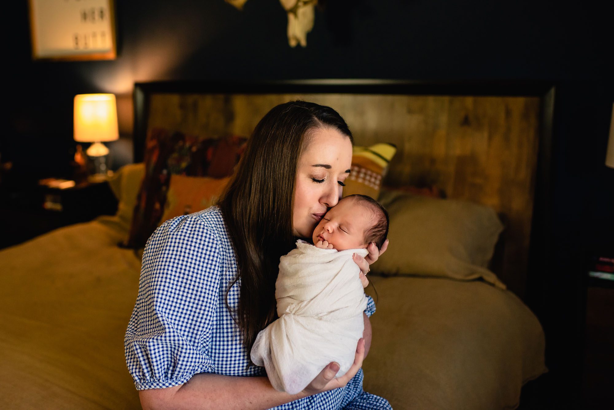 Mom kissing newborn baby boy, San Antonio Newborn Photographer