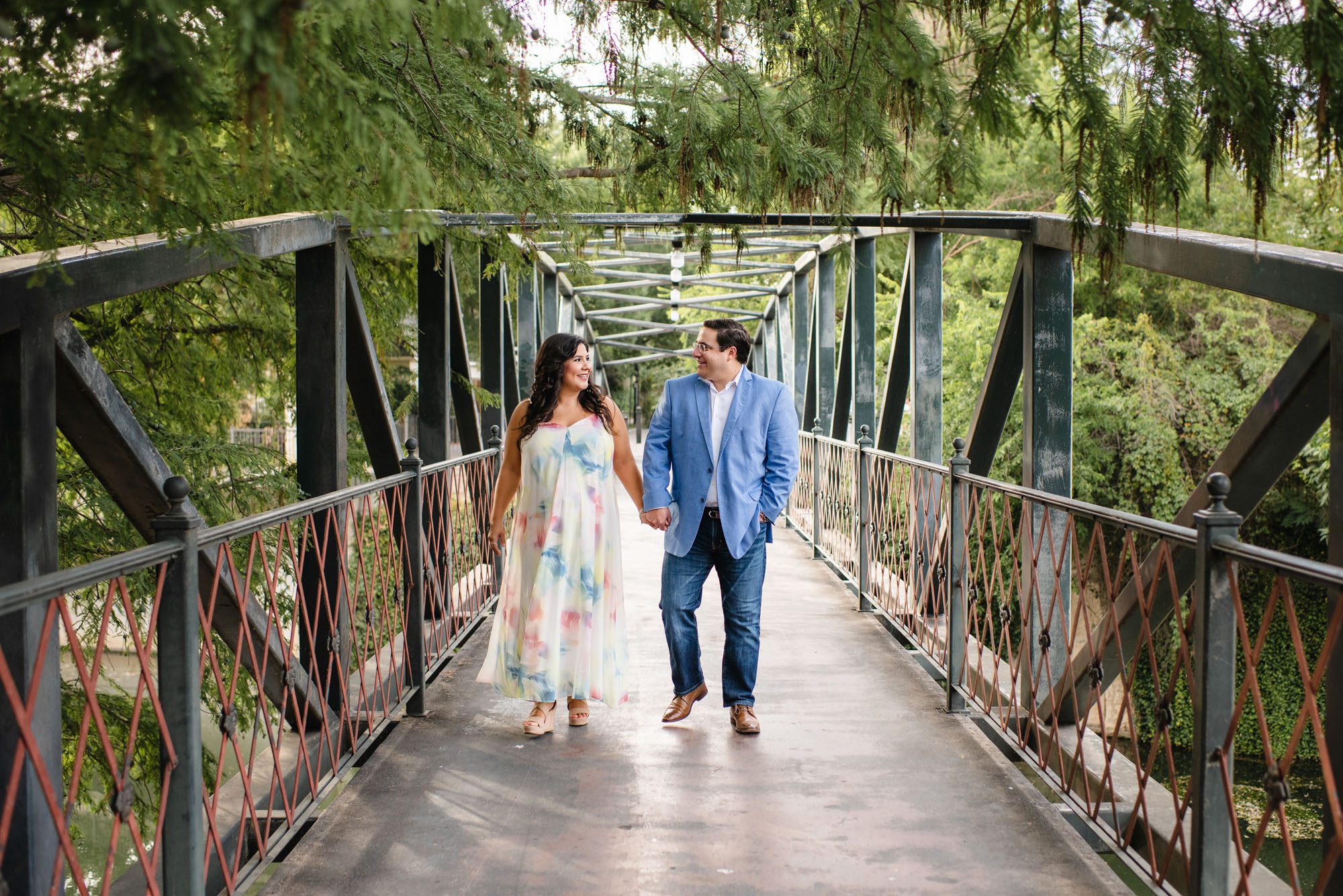 Pregnant couple walking on bridge, Best Maternity Photographer