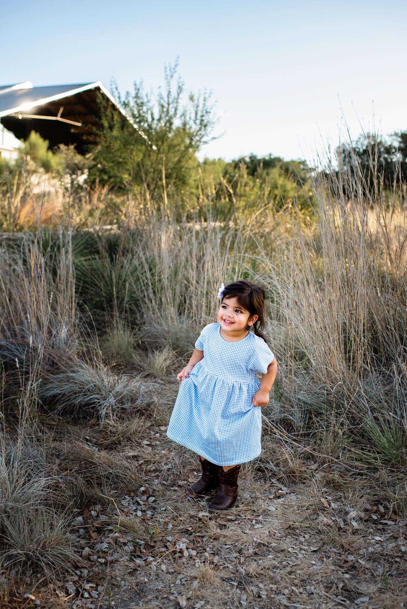 Daughter standing in a field, San Antonio family photographer