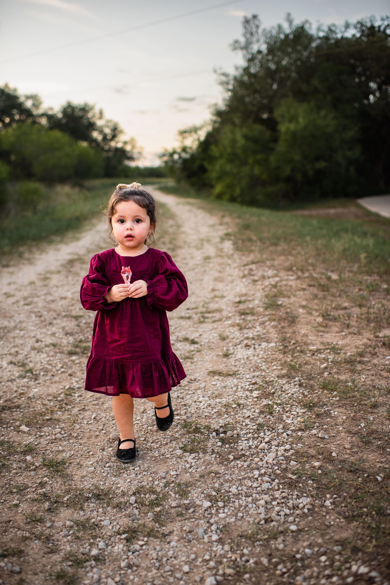 Little girl walking on a gravel road, San Antonio Lifestyle photographer