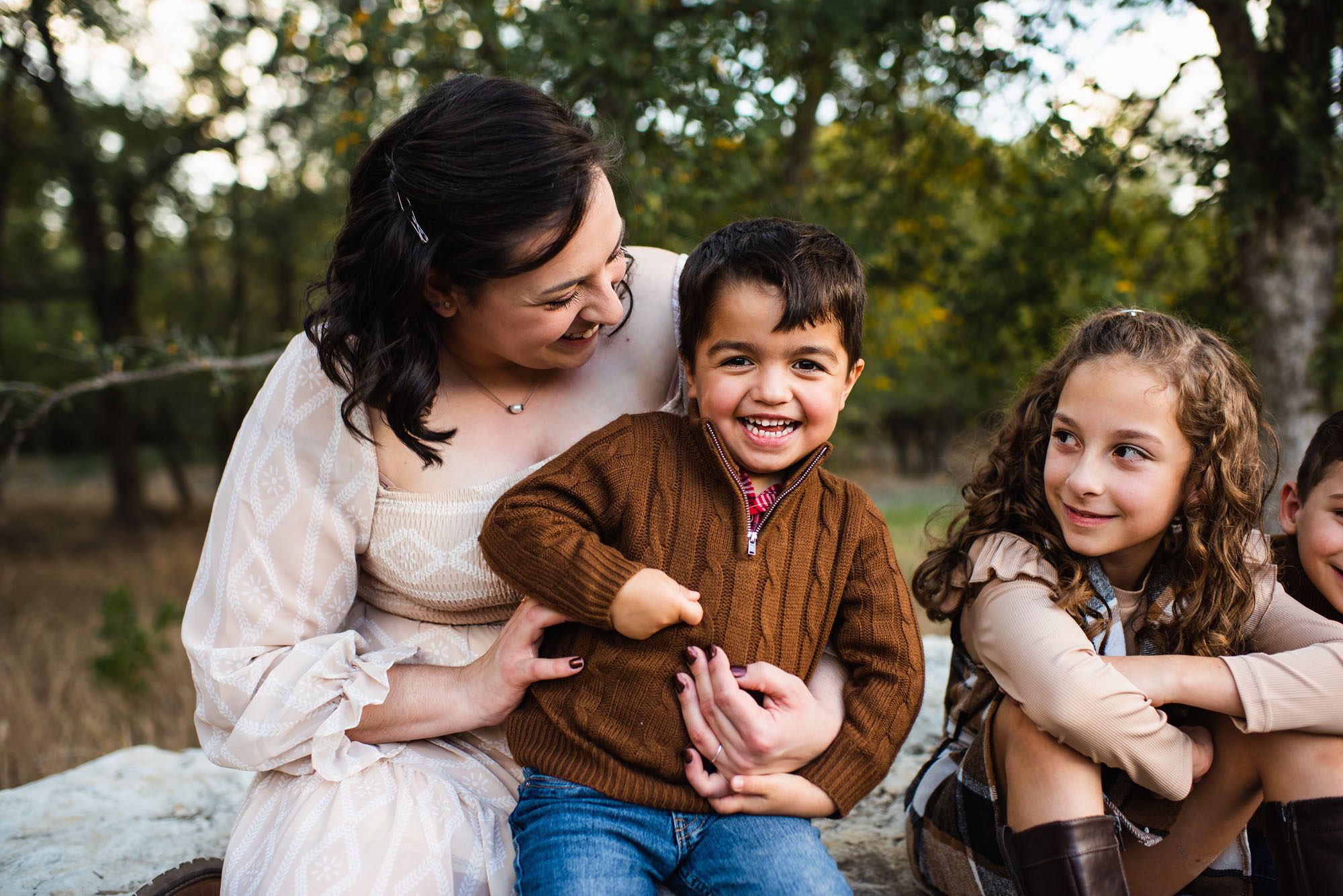 Close up of mother tickling son, San Antonio Family Lifestyle Photographer