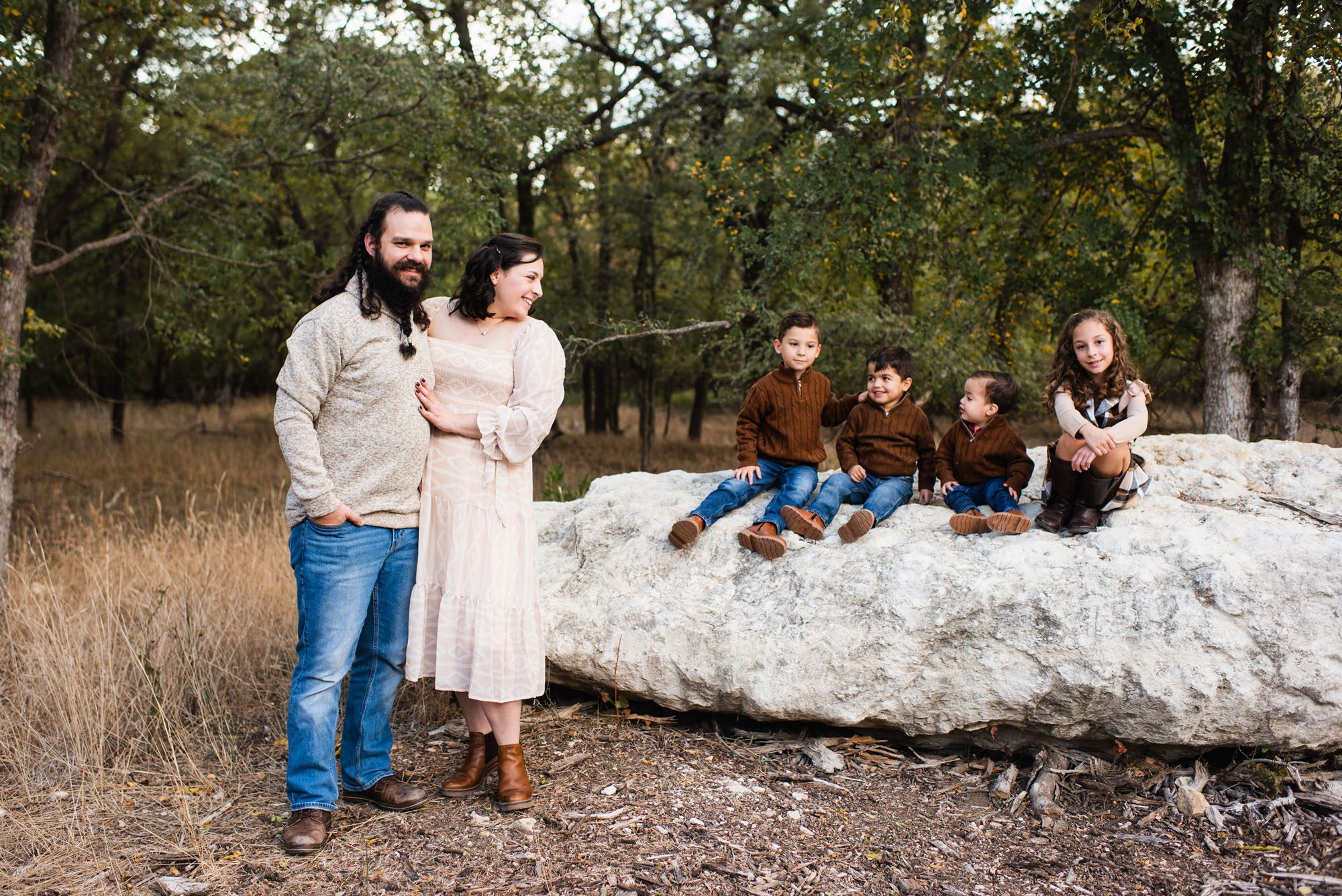 Kids sitting on rock together, San Antonio Family Photographer