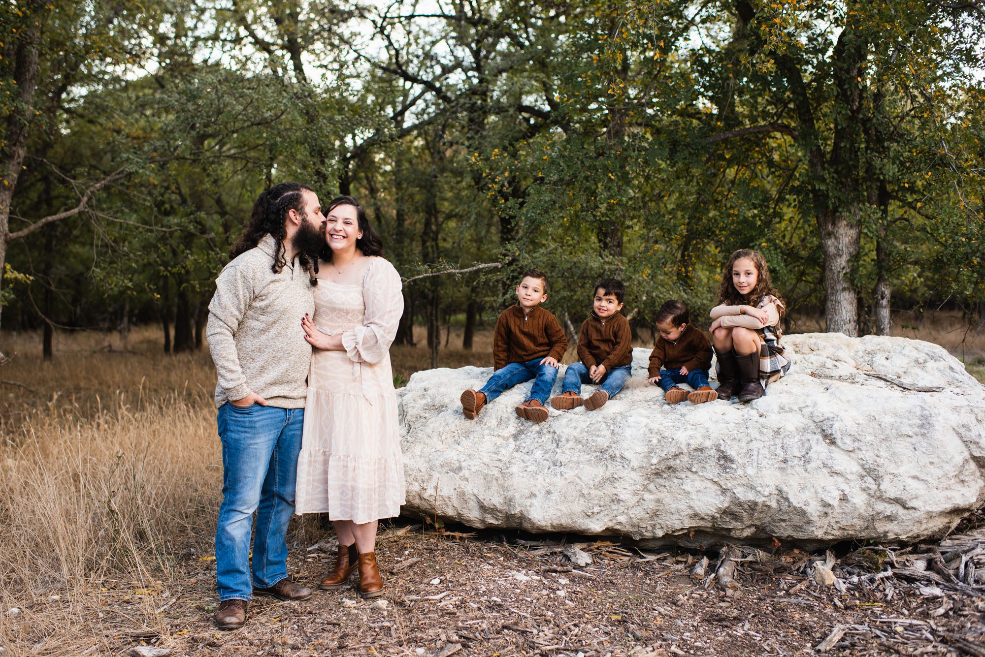 Kids sitting on rock together, San Antonio Family Lifestyle Photographer
