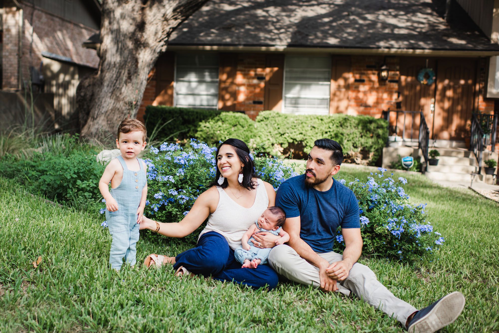 Family sitting in front yard, San Antonio family photographer