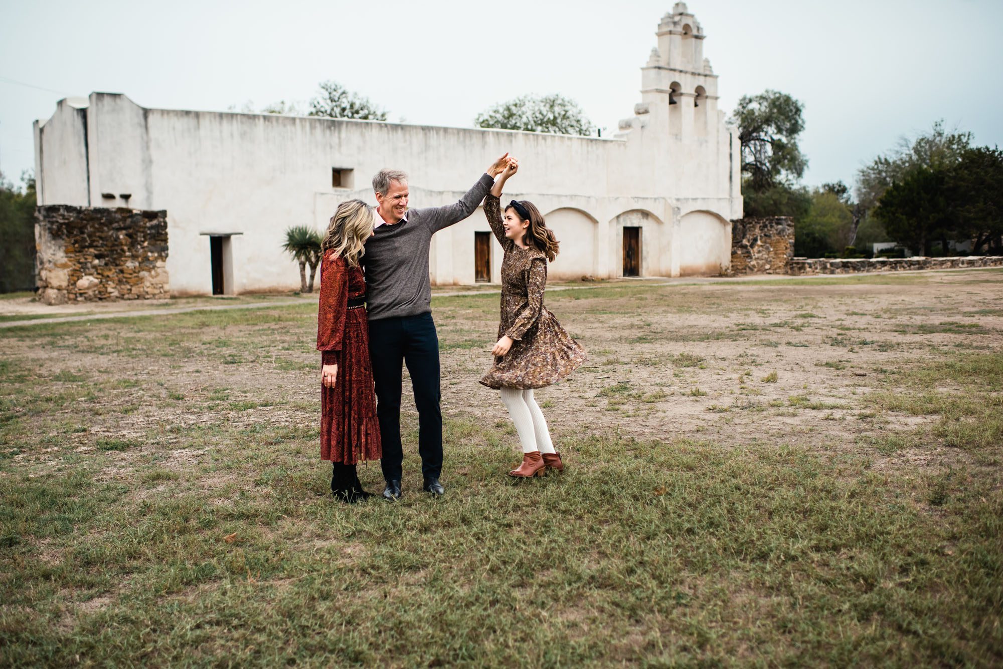 Father twirling daughter, San Antonio lifestyle photographer