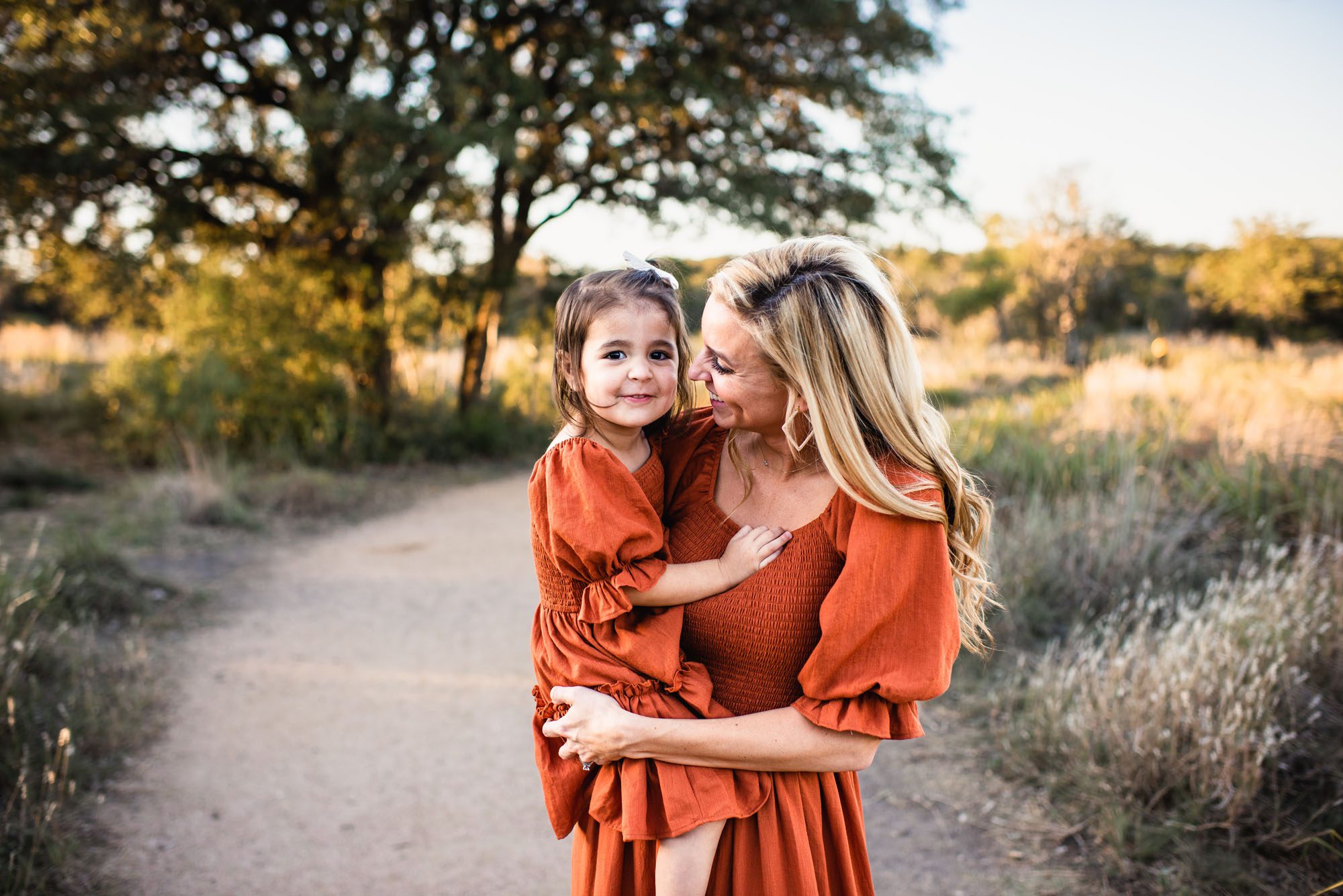 Mother smiling at daughter, San Antonio lifestyle photographer