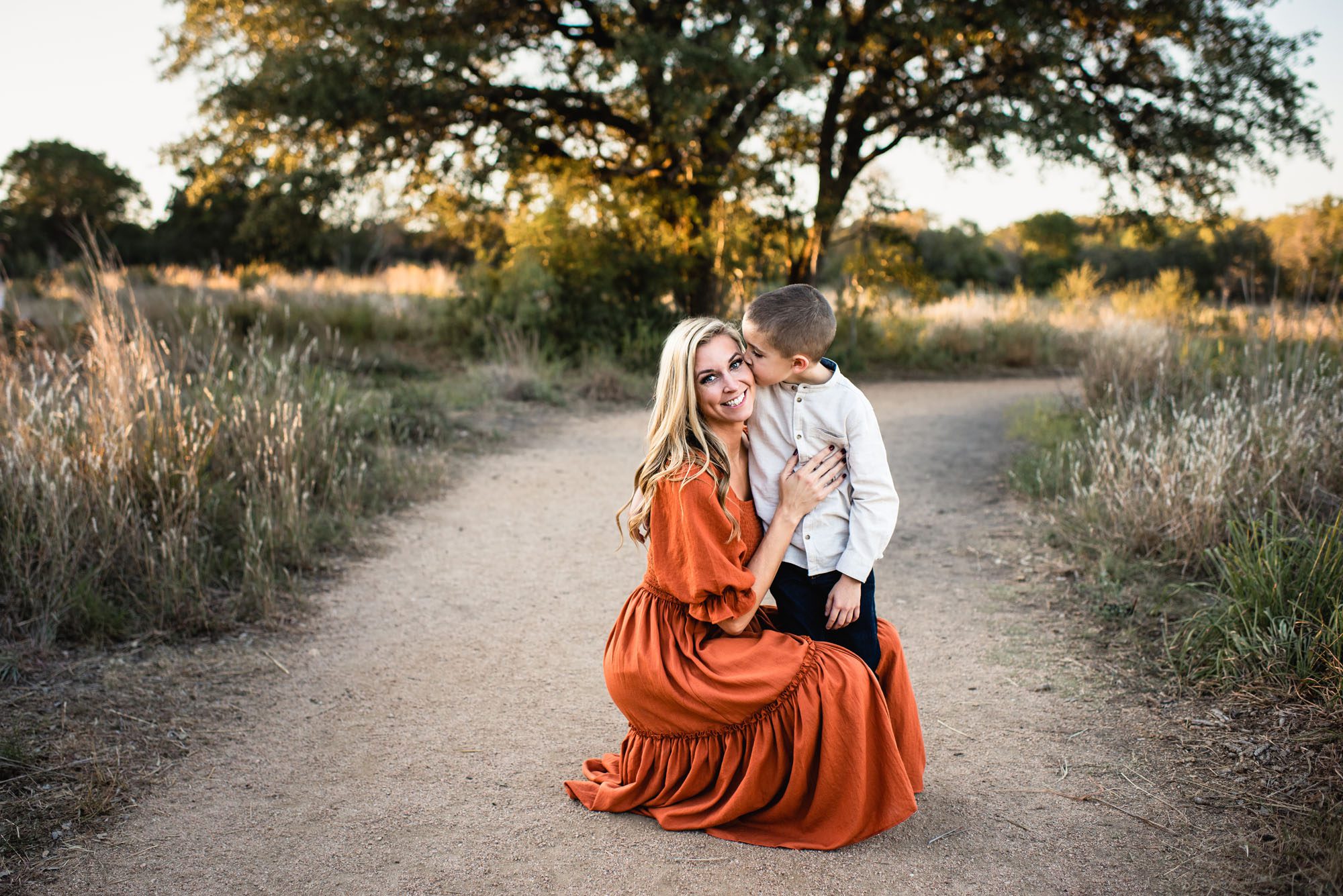 Son kissing mother's cheek, San Antonio lifestyle photographer