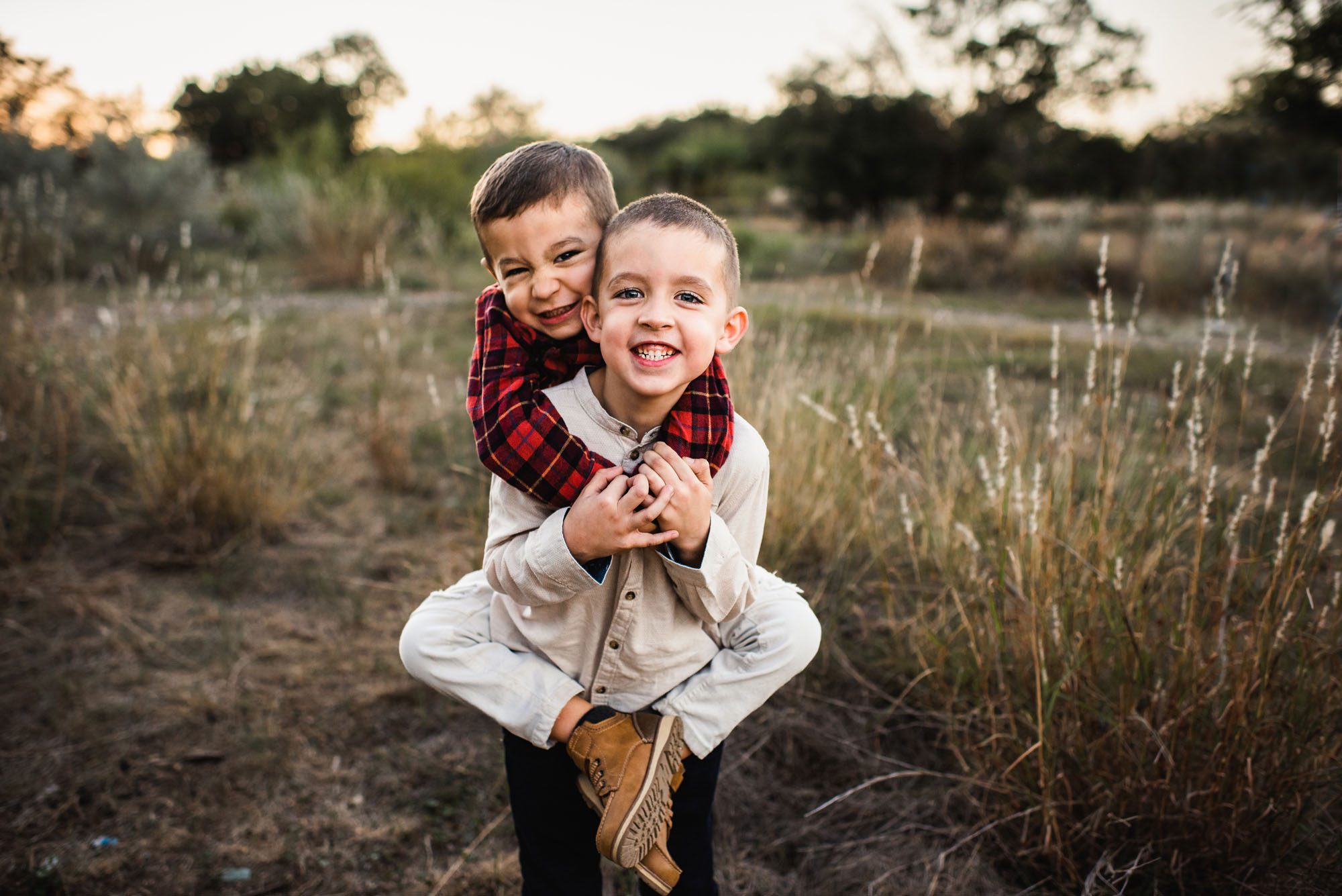 Boy holding brother on his back, San Antonio Lifestyle Photographer