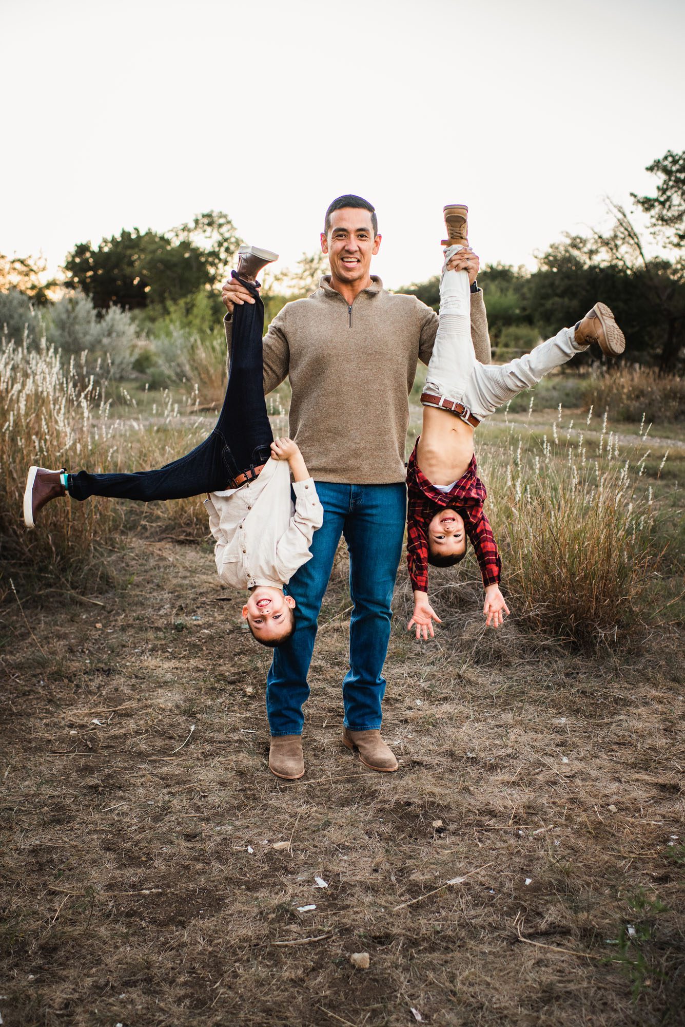 Dad holding boys upside down, San Antonio Lifestyle Photographer