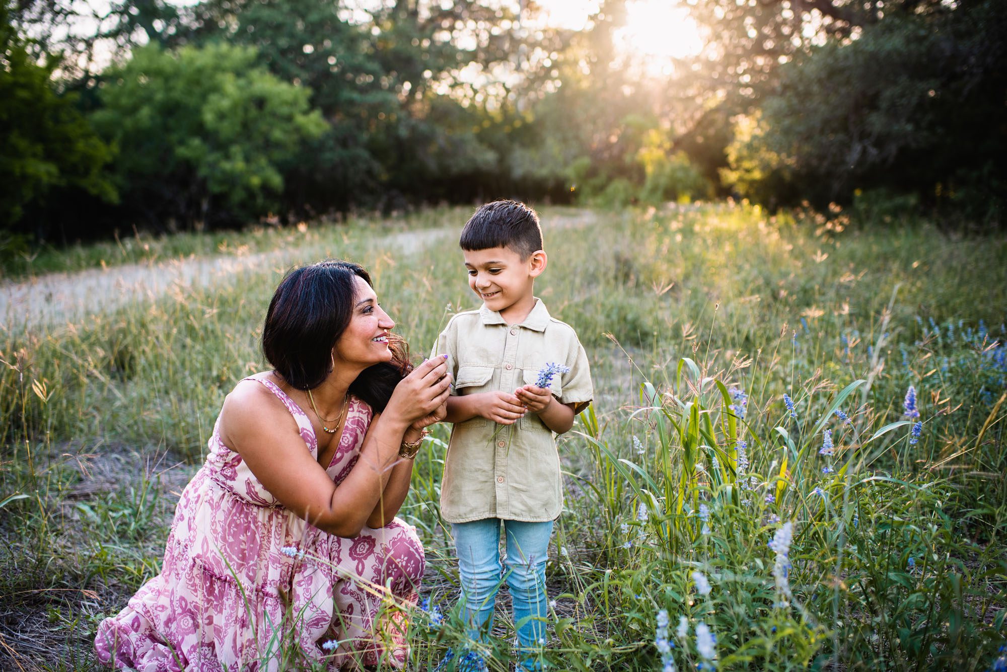 Mother and son picking wildflowers, San Antonio family photographer