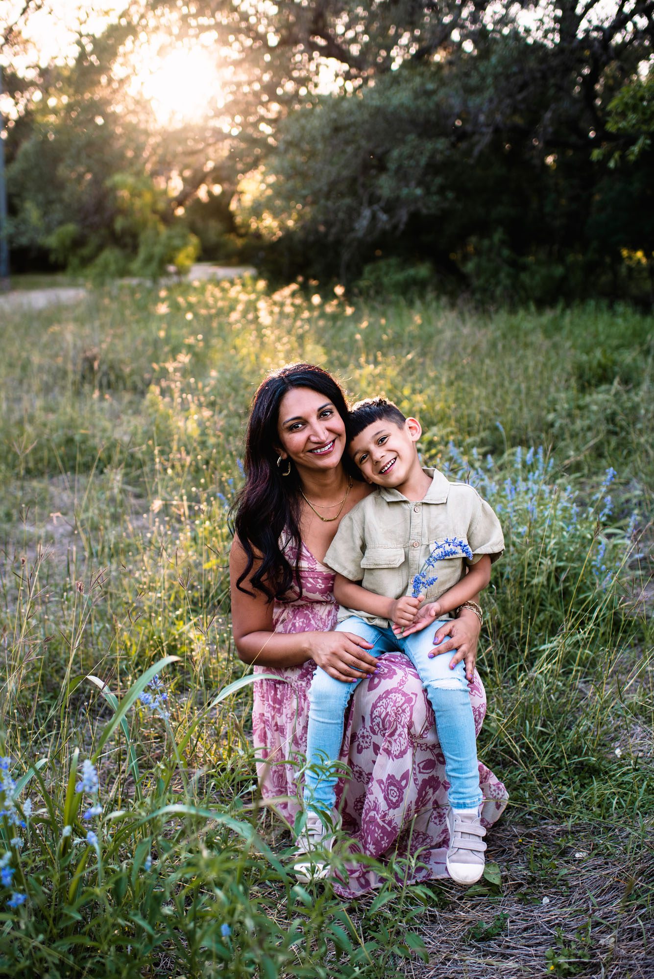 Mother and son sitting with wildflowers, best family photographer in San Antonio