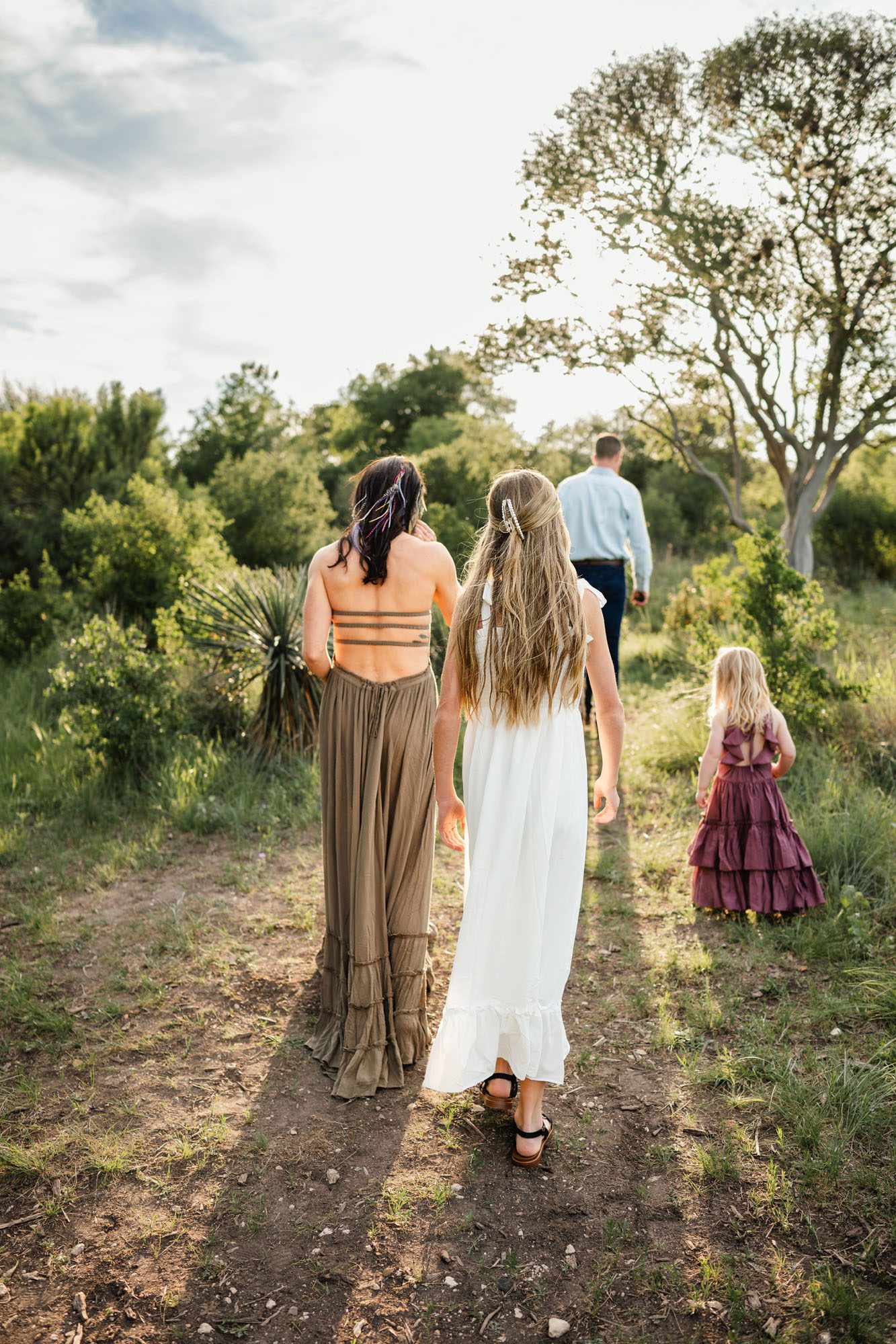 family walking away into the sunset, San Antonio family photographer