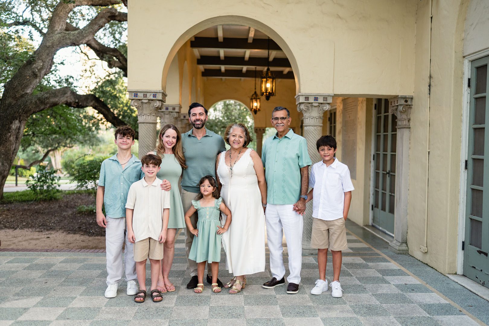 Extended family standing in front of archway, San Antonio extended family photographer